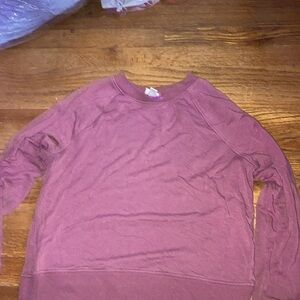 Magenta sweater, for wearing when your cold.